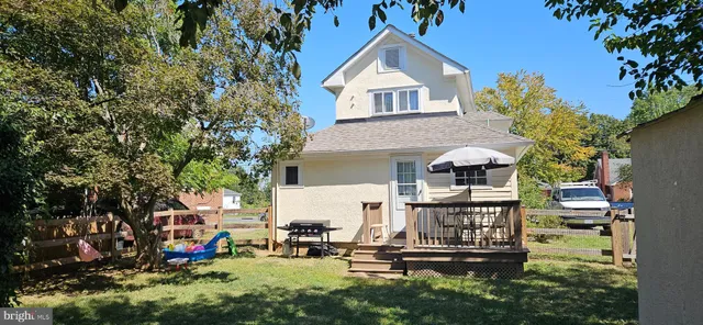 a view of a house with swimming pool