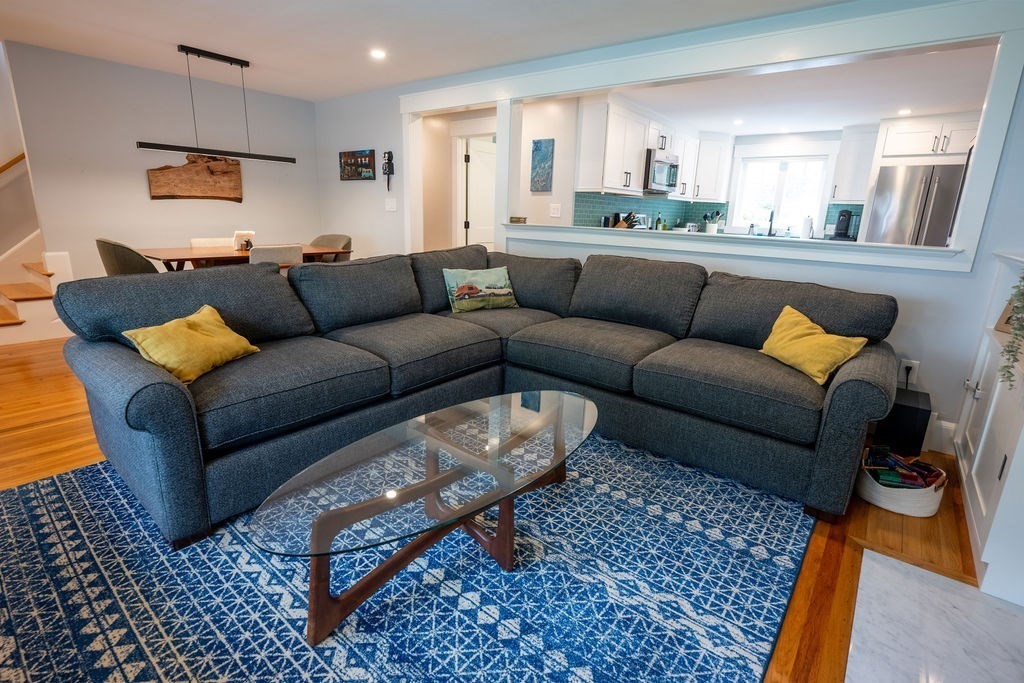 18 Belmore Road Natick, MA 01760 - Photo 23 of 30 a living room with furniture and a rug