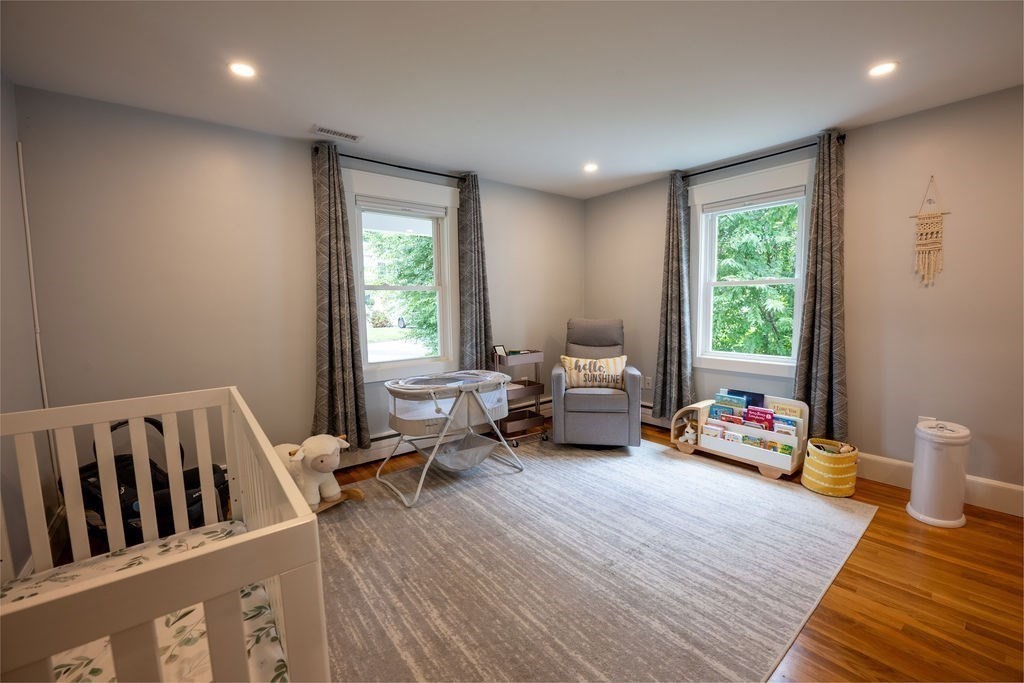 18 Belmore Road Natick, MA 01760 - Photo 10 of 30 a living room with furniture and a window