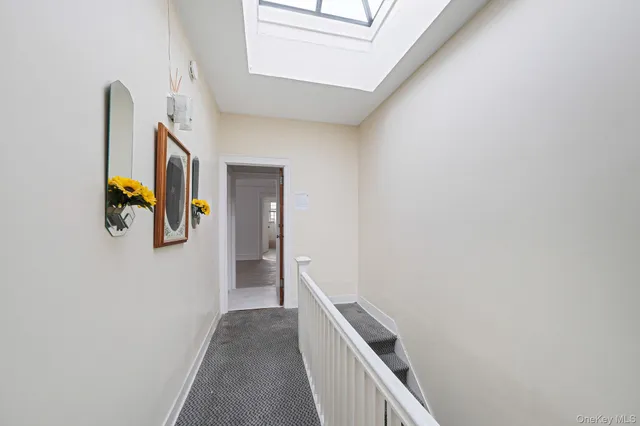 a view of a hallway with entryway