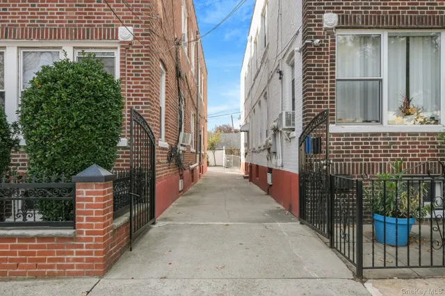 a view of a pathway along the building