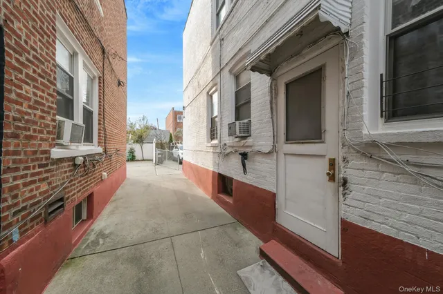 a view of a city street from a balcony