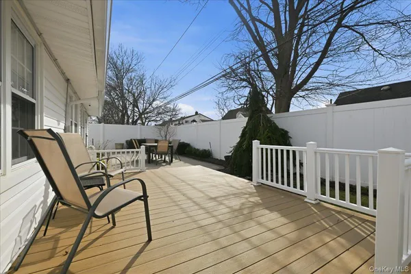 a view of a chairs and tables on the deck