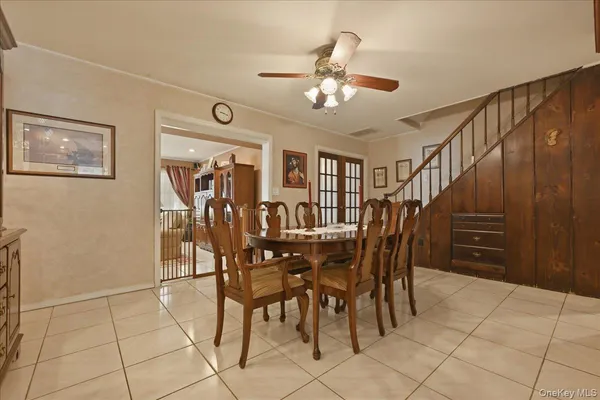 a view of a livingroom with furniture and chandelier