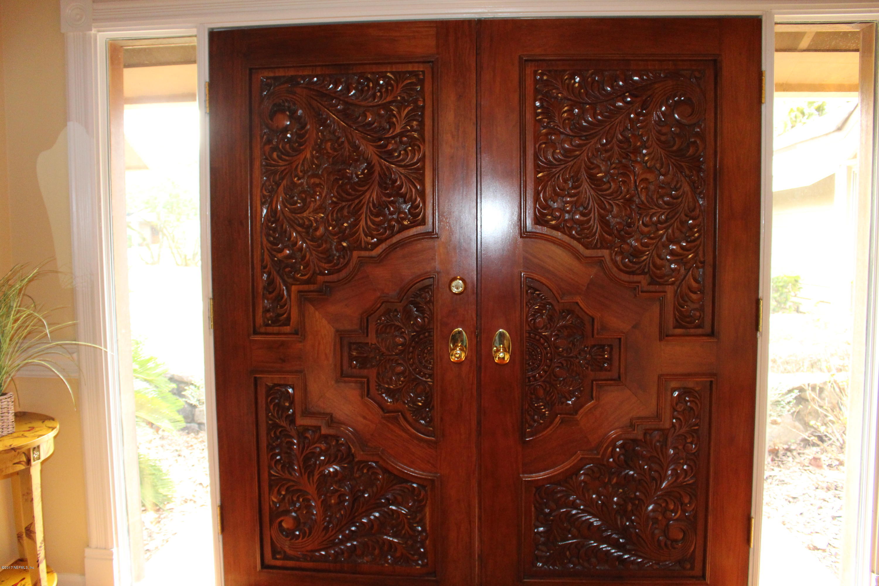 8097 Shady Grove Road Jacksonville, FL 32256 - Photo 4 of 29 Beautiful Carved Doors