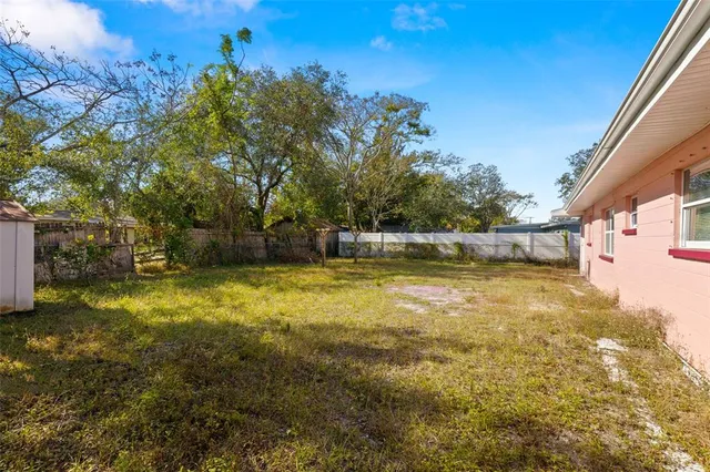 a view of a yard with an outdoor space
