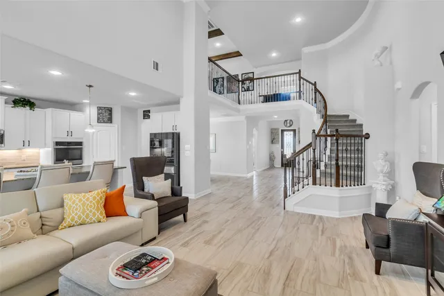 a view of a backyard with sitting area