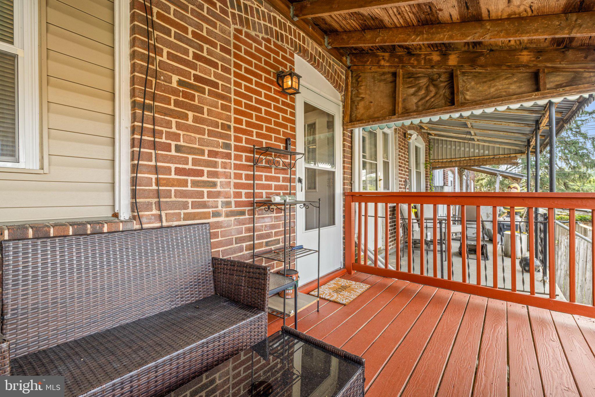 234 West Edgevale Road Baltimore, MD 21225 - Photo 23 of 45 Charming porch with rustic appeal.