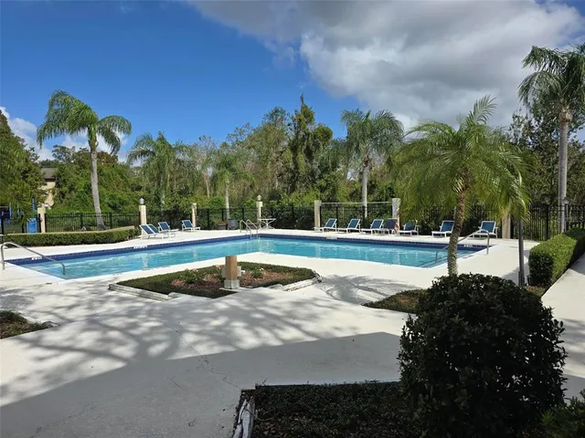 a view of a playground with basketball court