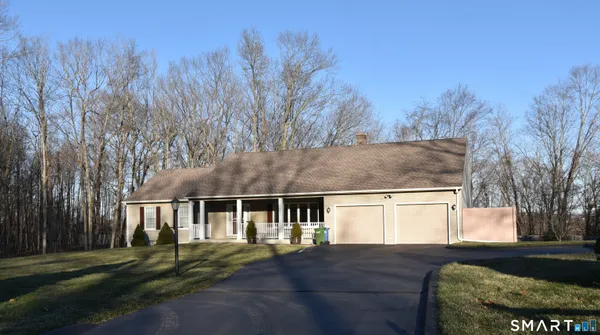 a view of house with outdoor space