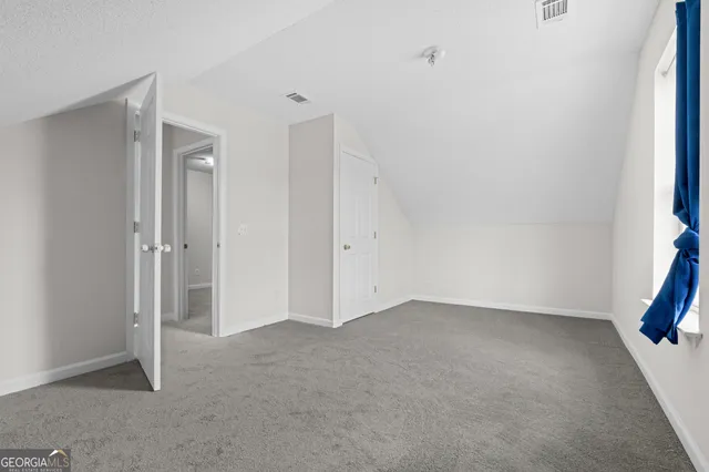 an empty room with closet