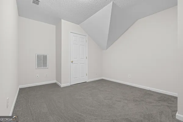 an empty room with an entryway