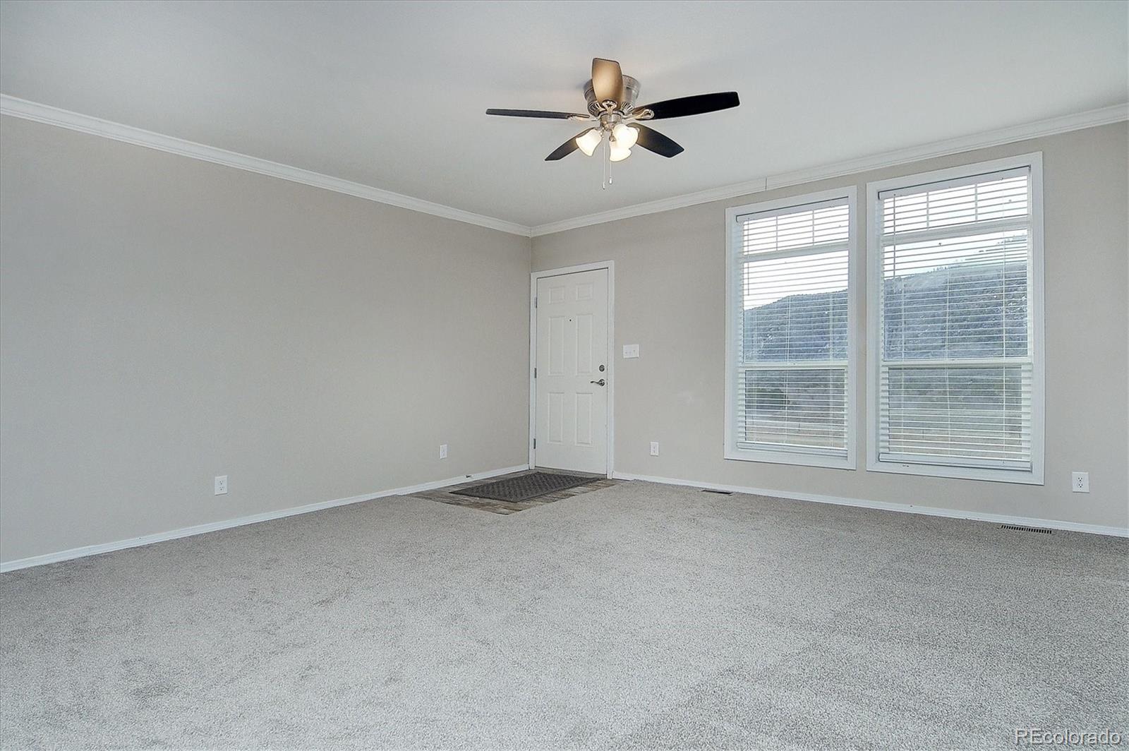 16554 Rocky Mountain Road Salida, CO 81201 - Photo 4 of 33 a view of an empty room with a window