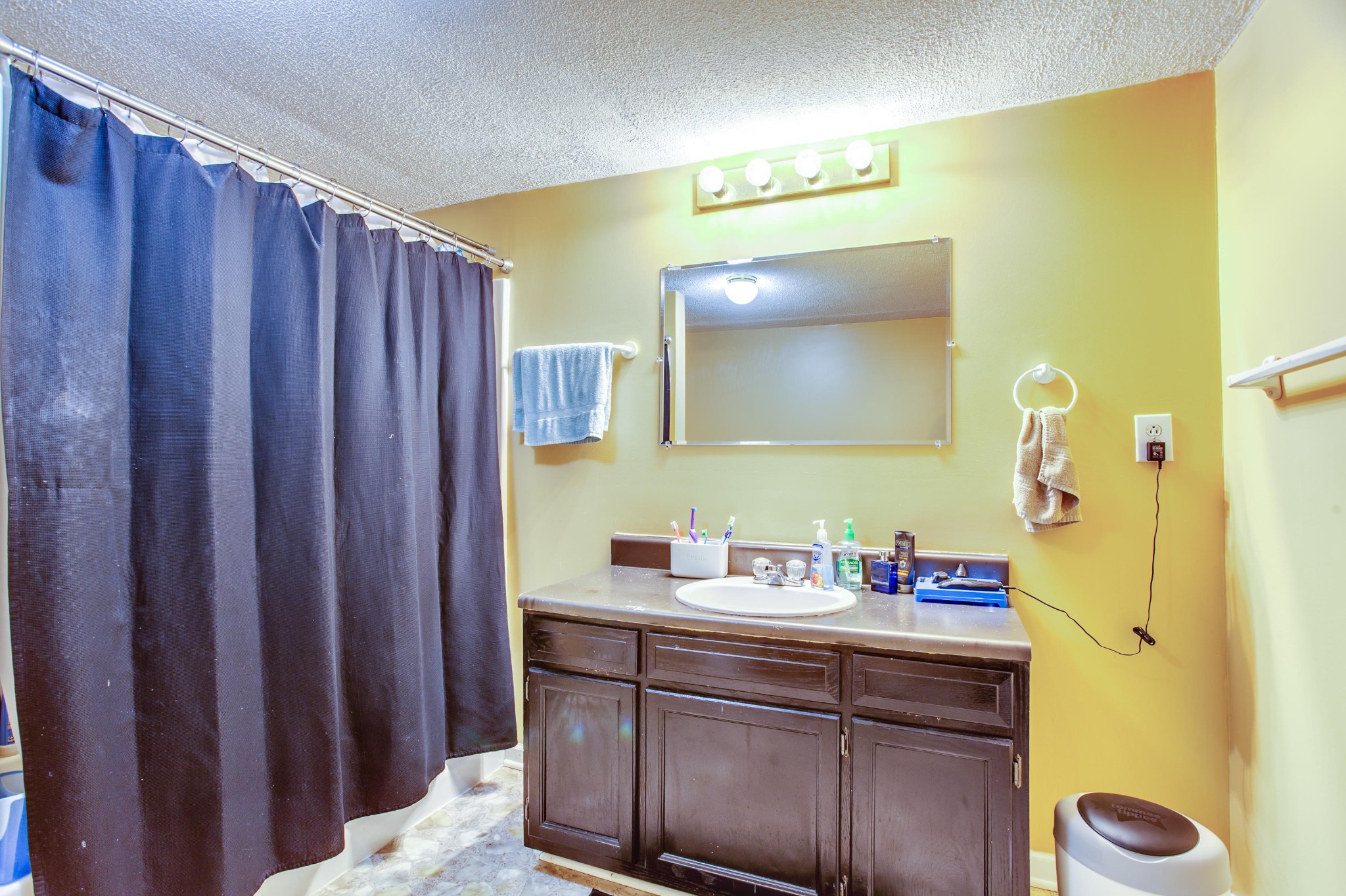 4332 Shipe Road Corryton, TN 37721 - Photo 12 of 25 a bathroom with a sink vanity and a mirror