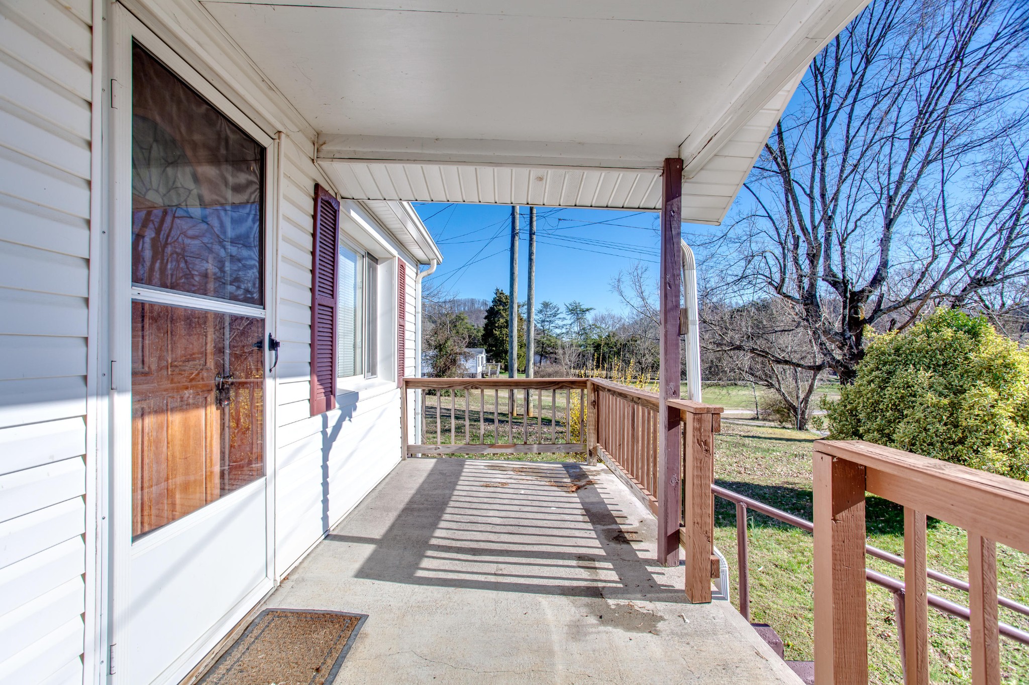 4332 Shipe Road Corryton, TN 37721 - Photo 2 of 25 a view of a balcony with wooden floor and fence