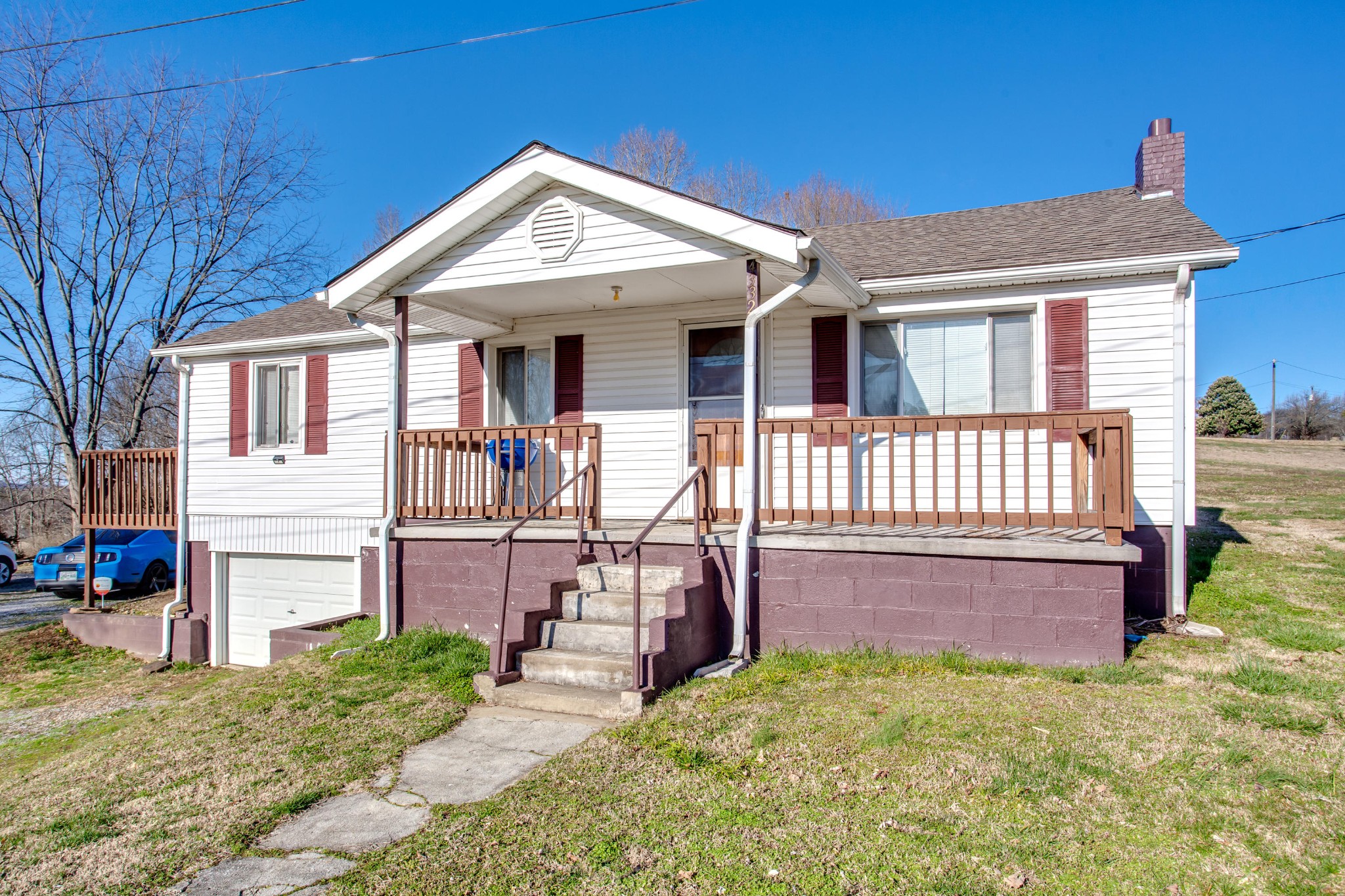 4332 Shipe Road Corryton, TN 37721 - Photo 24 of 25 a view of a house with a yard porch and wooden fence