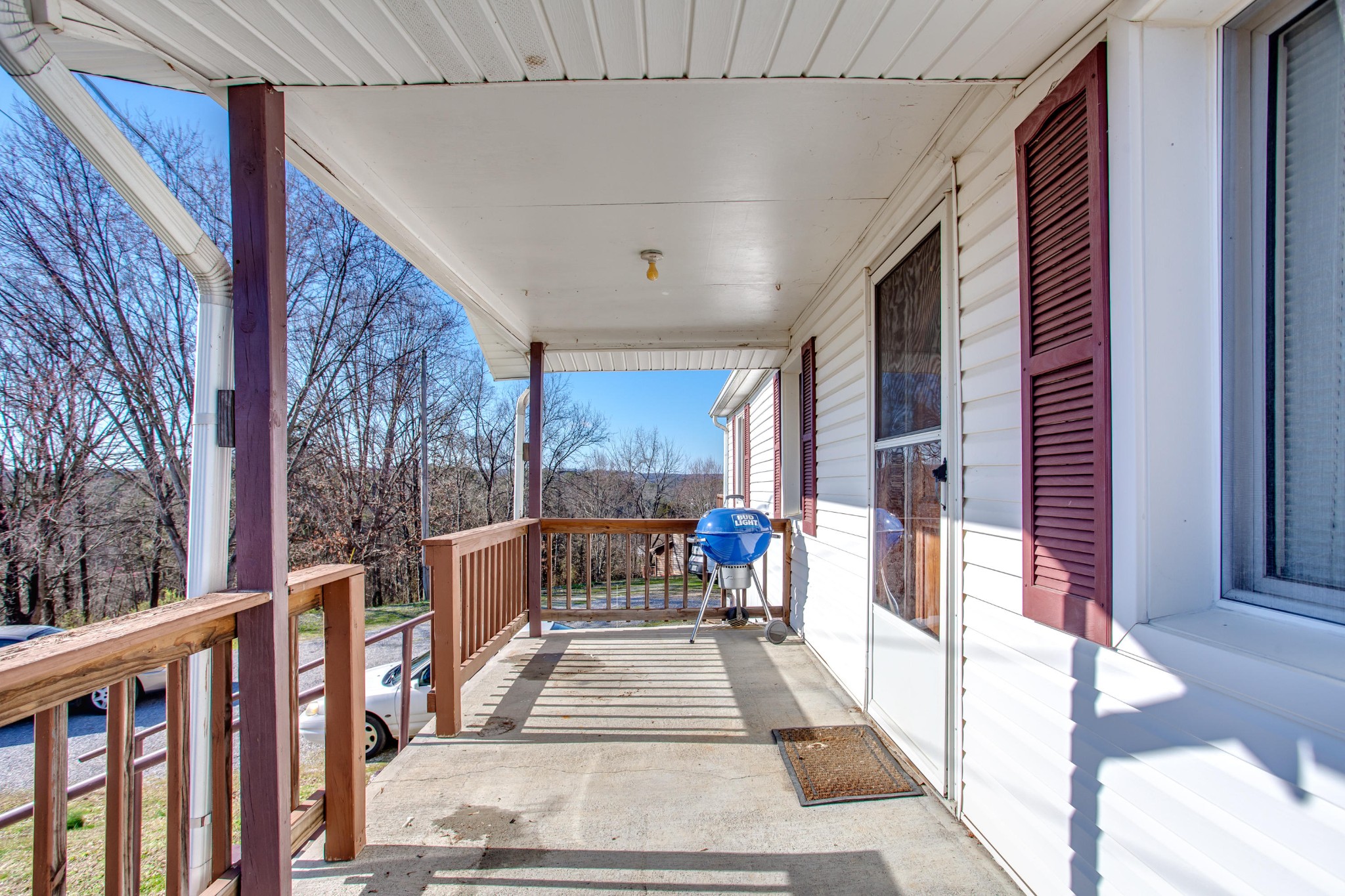4332 Shipe Road Corryton, TN 37721 - Photo 3 of 25 a view of a patio with a table and chairs and wooden floor