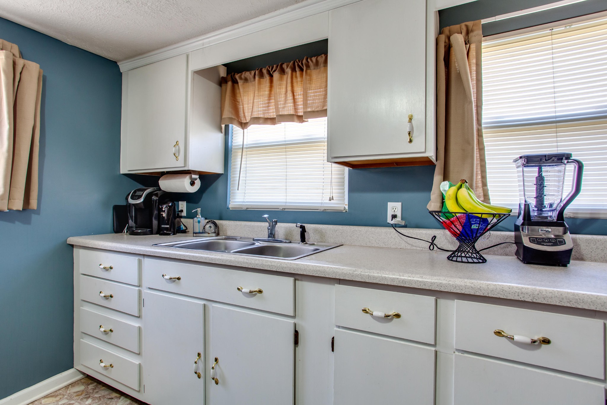 4332 Shipe Road Corryton, TN 37721 - Photo 9 of 25 a kitchen with appliances cabinets and a window