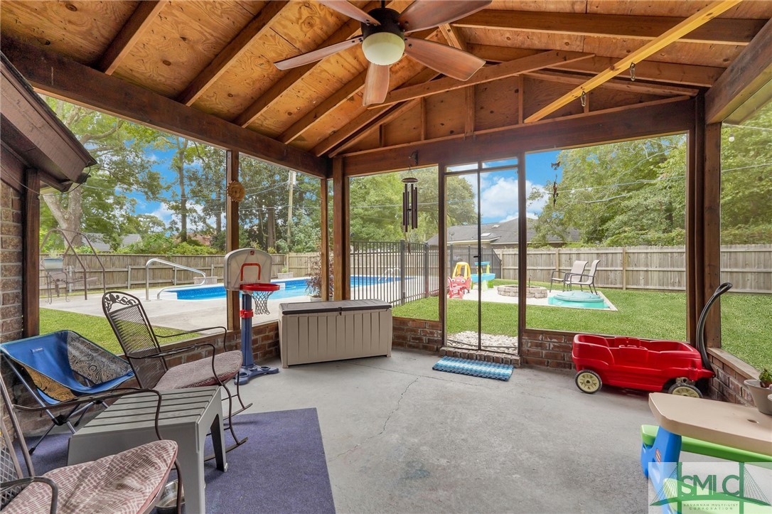607 Wild Turkey Road Savannah, GA 31406 - Photo 37 of 47 Screened in Patio off the living room.