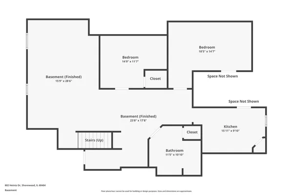 a front view of a house with swimming pool and furniture