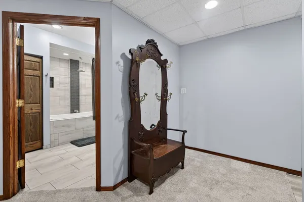 a view of a house with a yard and sitting area