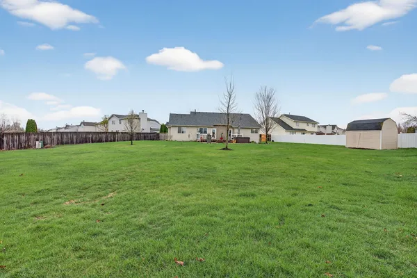 a view of a livingroom with wooden floor