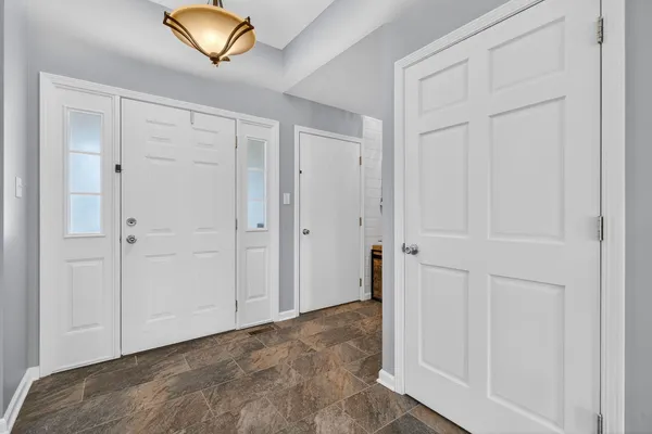 a view of a livingroom with furniture and a livingroom