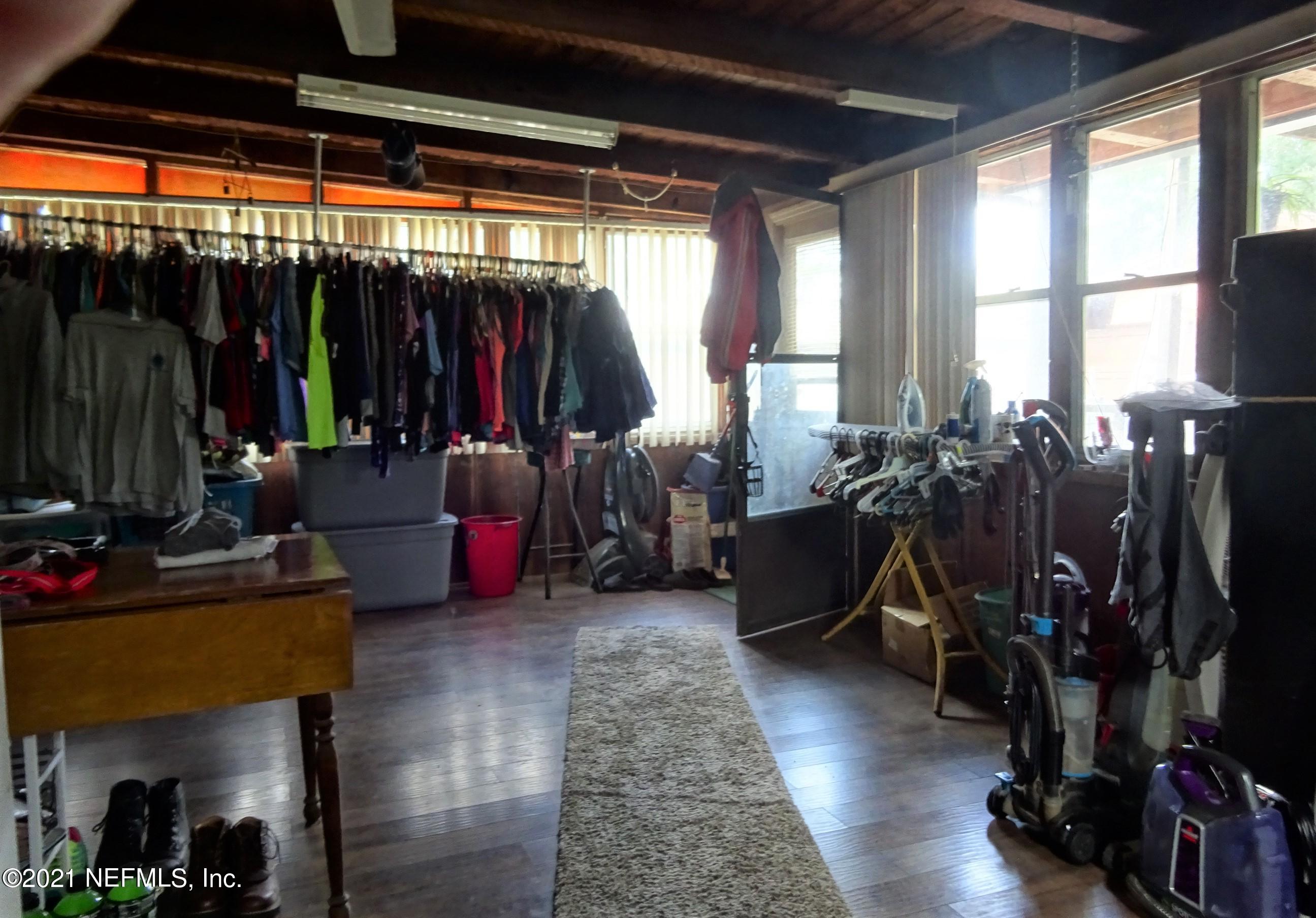 9347 Orme Road Jacksonville, FL 32220 - Photo 40 of 46 a view of a room with gym equipment