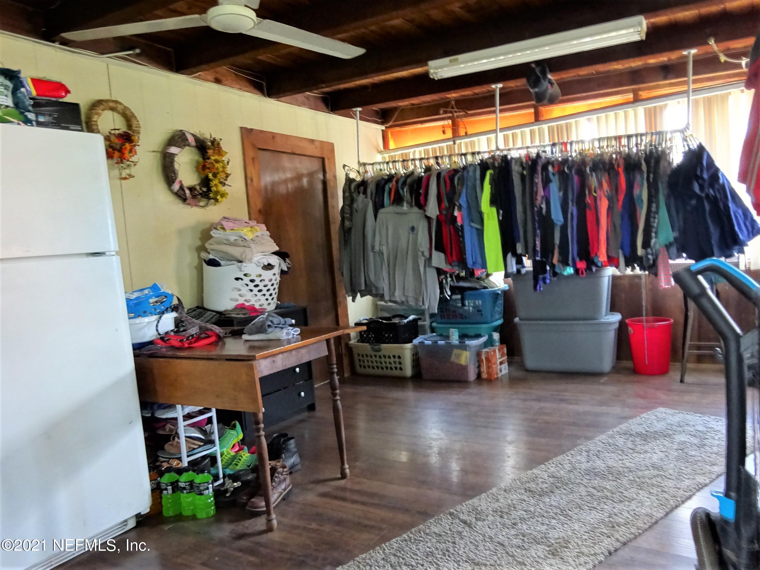9347 Orme Road Jacksonville, FL 32220 - Photo 41 of 46 a view of storage and utility room