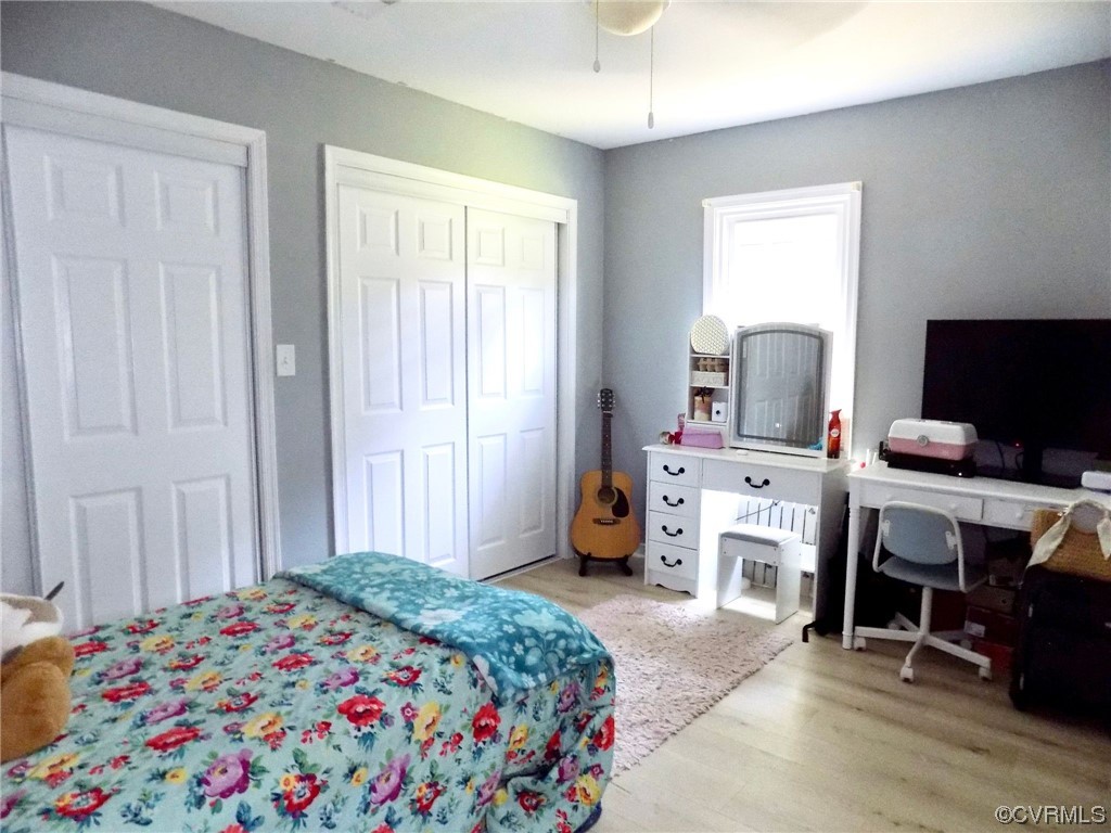 10770 Old Centralia Road Chester, VA 23831 - Photo 11 of 25 a bedroom with a bed and flat screen tv