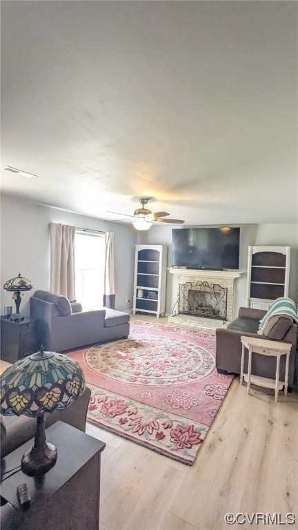 10770 Old Centralia Road Chester, VA 23831 - Photo 15 of 25 a living room with furniture and a fireplace