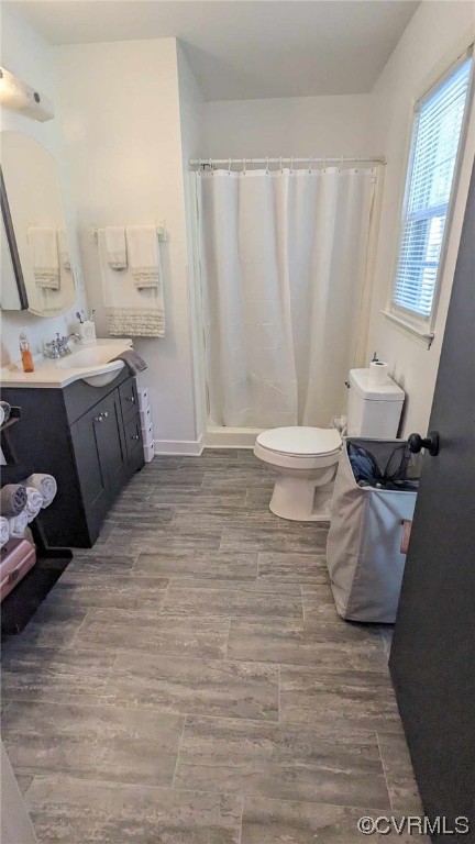 10770 Old Centralia Road Chester, VA 23831 - Photo 25 of 25 a bathroom with a sink and a toilet