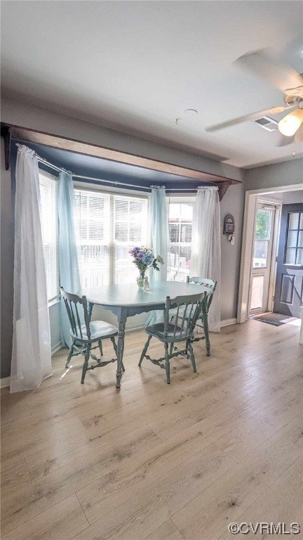 10770 Old Centralia Road Chester, VA 23831 - Photo 5 of 25 a view of a dining room with furniture and wooden floor