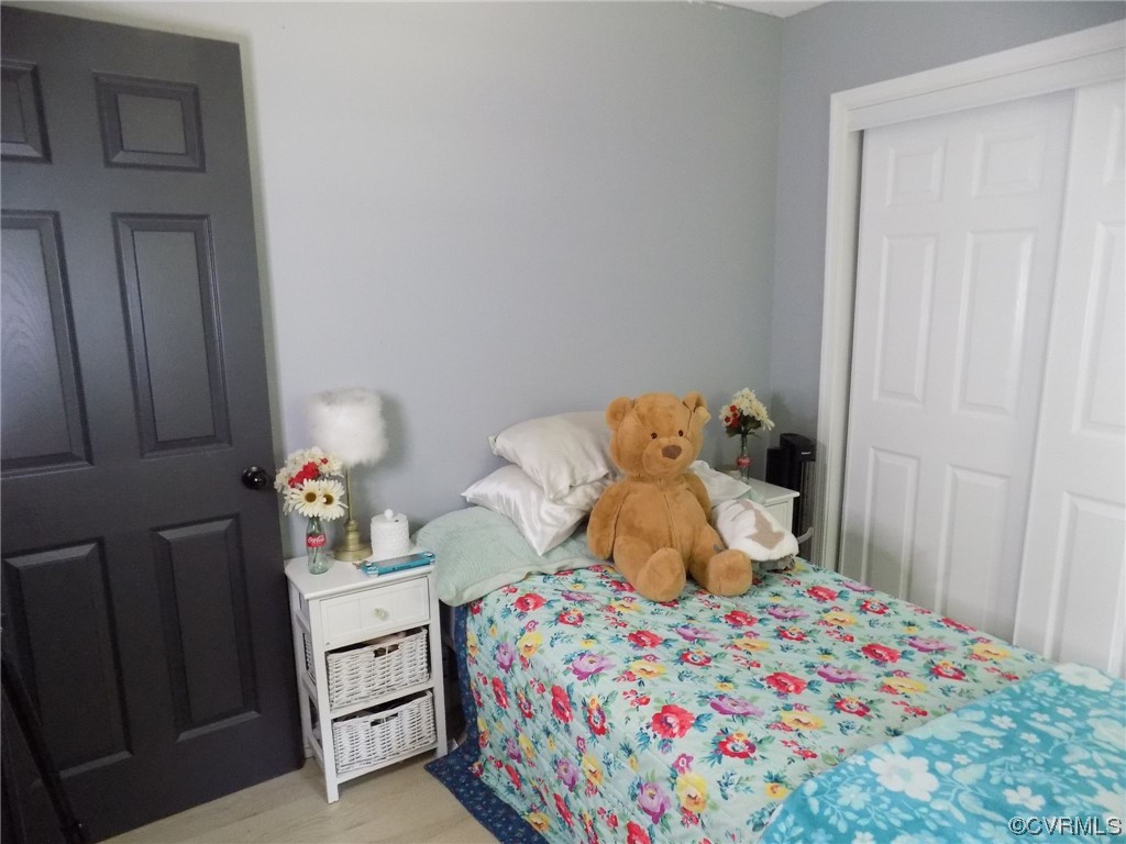 10770 Old Centralia Road Chester, VA 23831 - Photo 10 of 25 a bedroom with a bed and a window