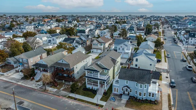 an aerial view of a building with parking