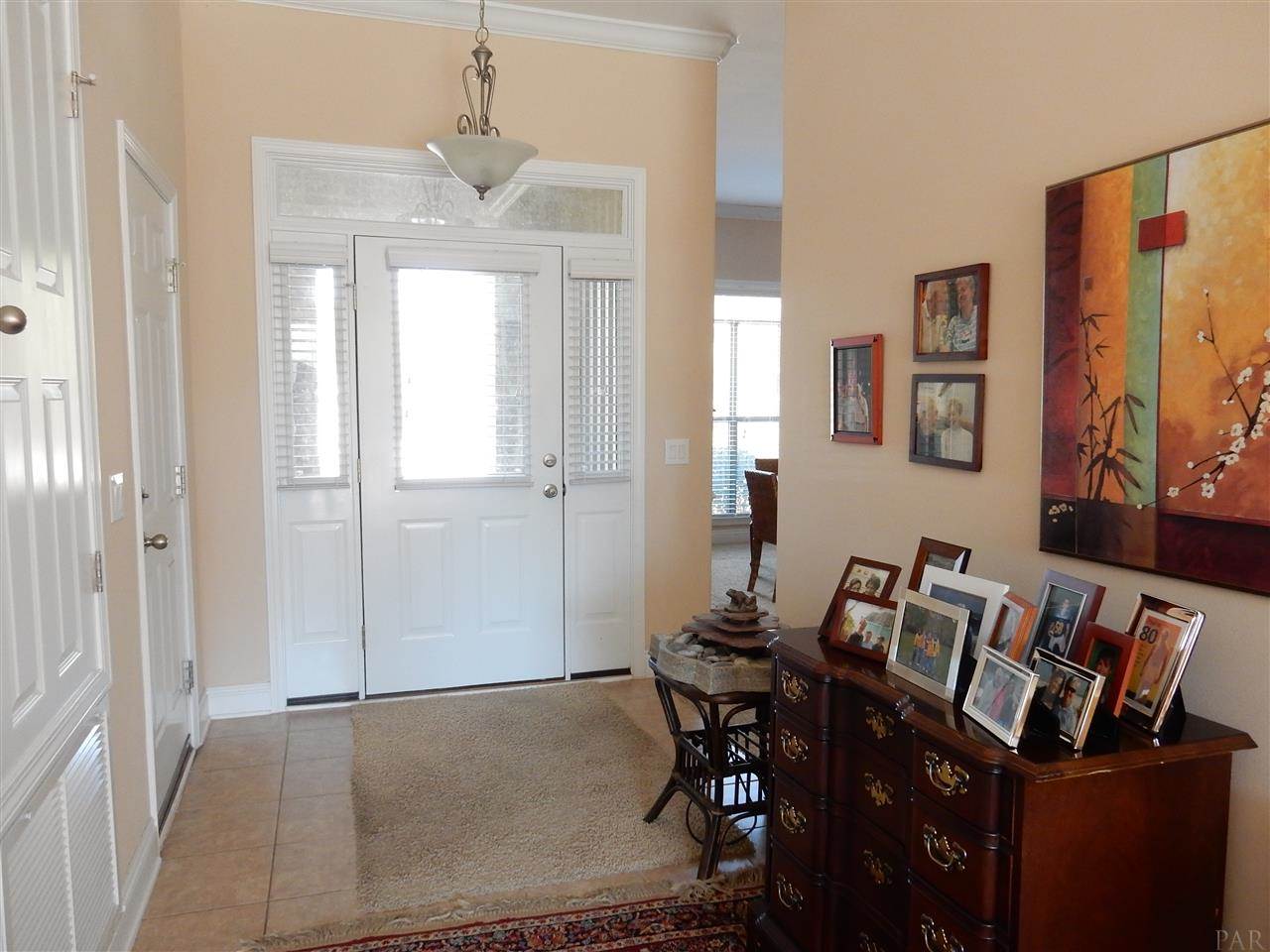 32615 Arbor Ridge Circle Lillian, AL 36549 - Photo 4 of 27 a view of a dining room with furniture