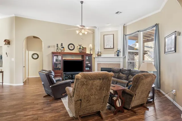 a view of a livingroom with furniture and a chandelier