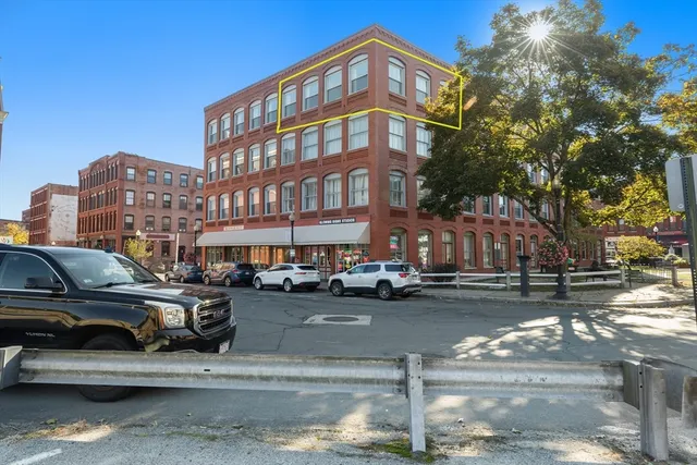 a view of a cars parked in front of a house