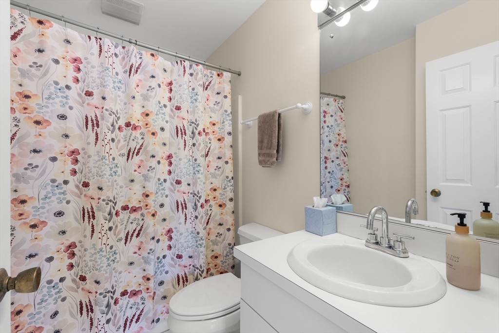 80 Wingate Street, Unit 4C Haverhill, MA 01832 - Photo 11 of 27 a bathroom with a sink toilet and shower