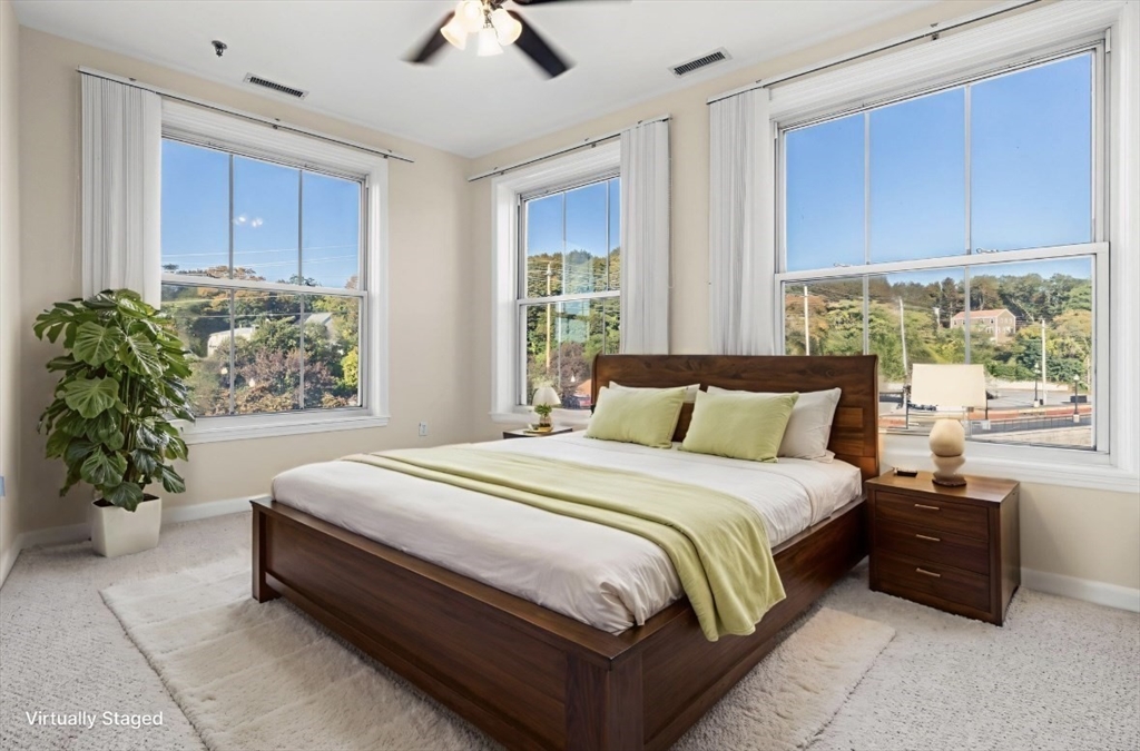 80 Wingate Street, Unit 4C Haverhill, MA 01832 - Photo 13 of 27 a bedroom with bed and window