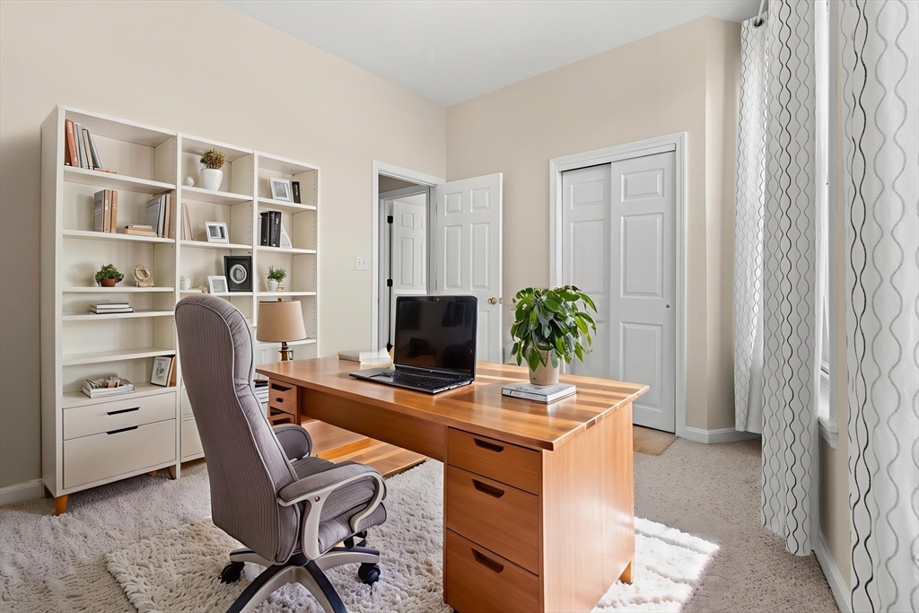 80 Wingate Street, Unit 4C Haverhill, MA 01832 - Photo 17 of 27 a workspace with furniture and a window