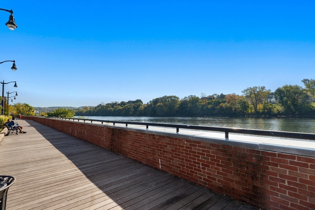 80 Wingate Street, Unit 4C Haverhill, MA 01832 - Photo 21 of 27 a view of building with lake view and mountain view