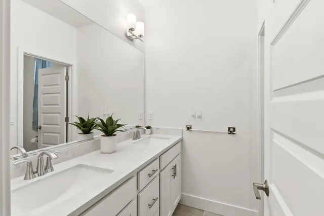 a bathroom with a bathtub and shower
