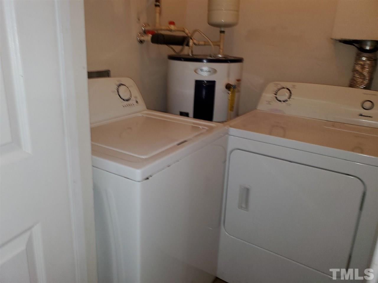 2011 Quaker Landing, Unit 103 Raleigh, NC 27603 - Photo 10 of 11 The washer and dryer are in their own space and are included with the sale