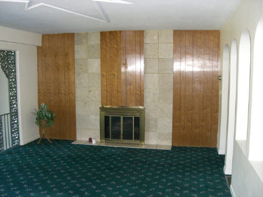 6308 Park Ridge Road Loves Park, IL 61111 - Photo 2 of 6 a view of an empty room with window and stairs