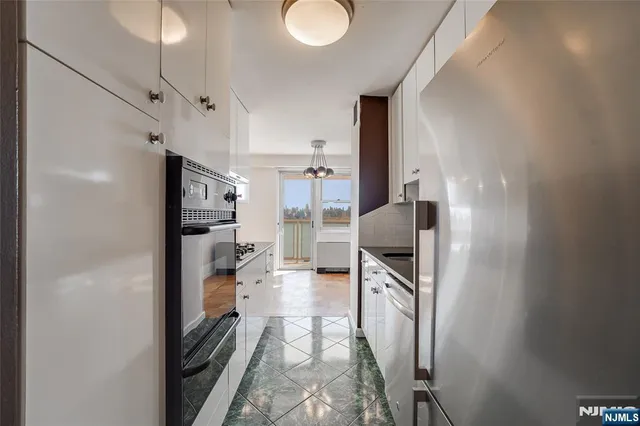a view of kitchen and living room