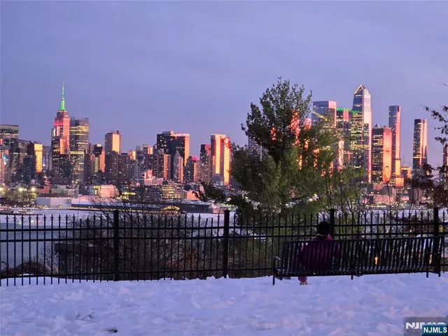 a view of city with tall buildings