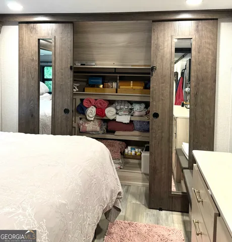 a kitchen with a stove and a microwave