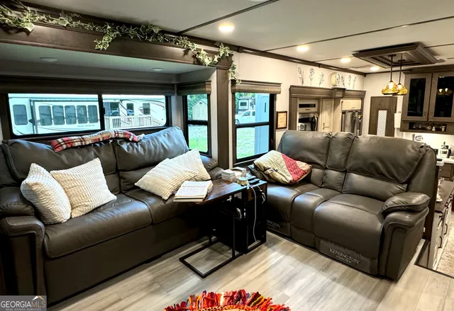 a roof deck view with sitting space and garden space