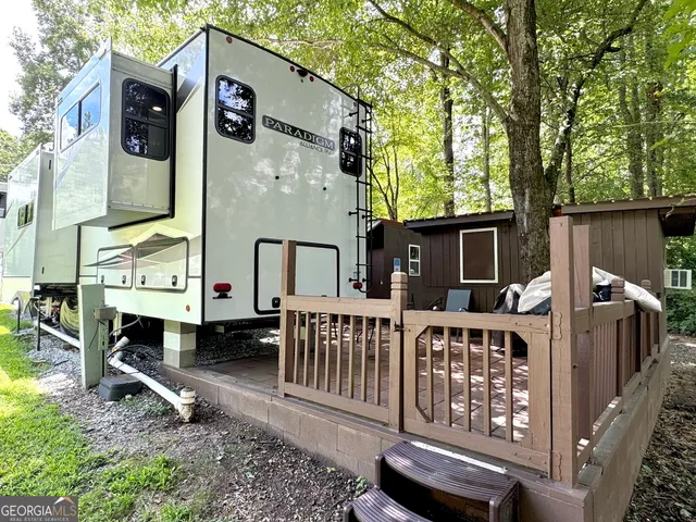 a room with furniture and a wooden floor